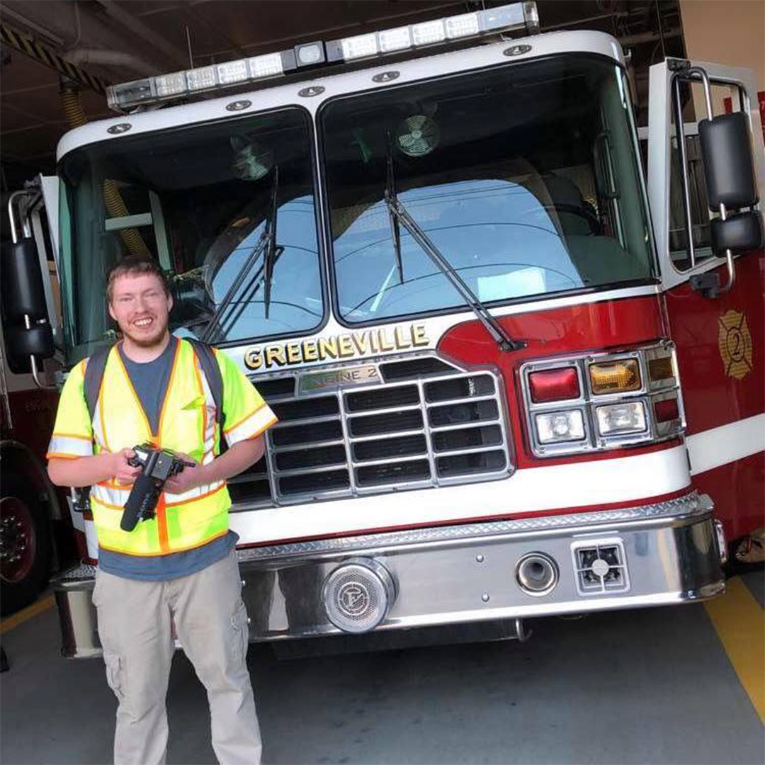 Jeffrey Hynds portrait in front of a fire engine